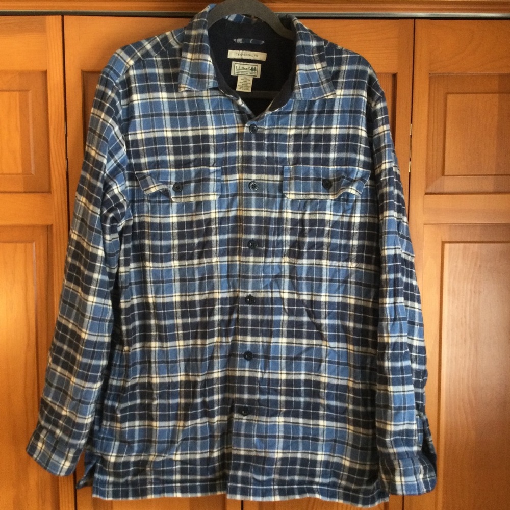 Fleece lined flannel button down coat.